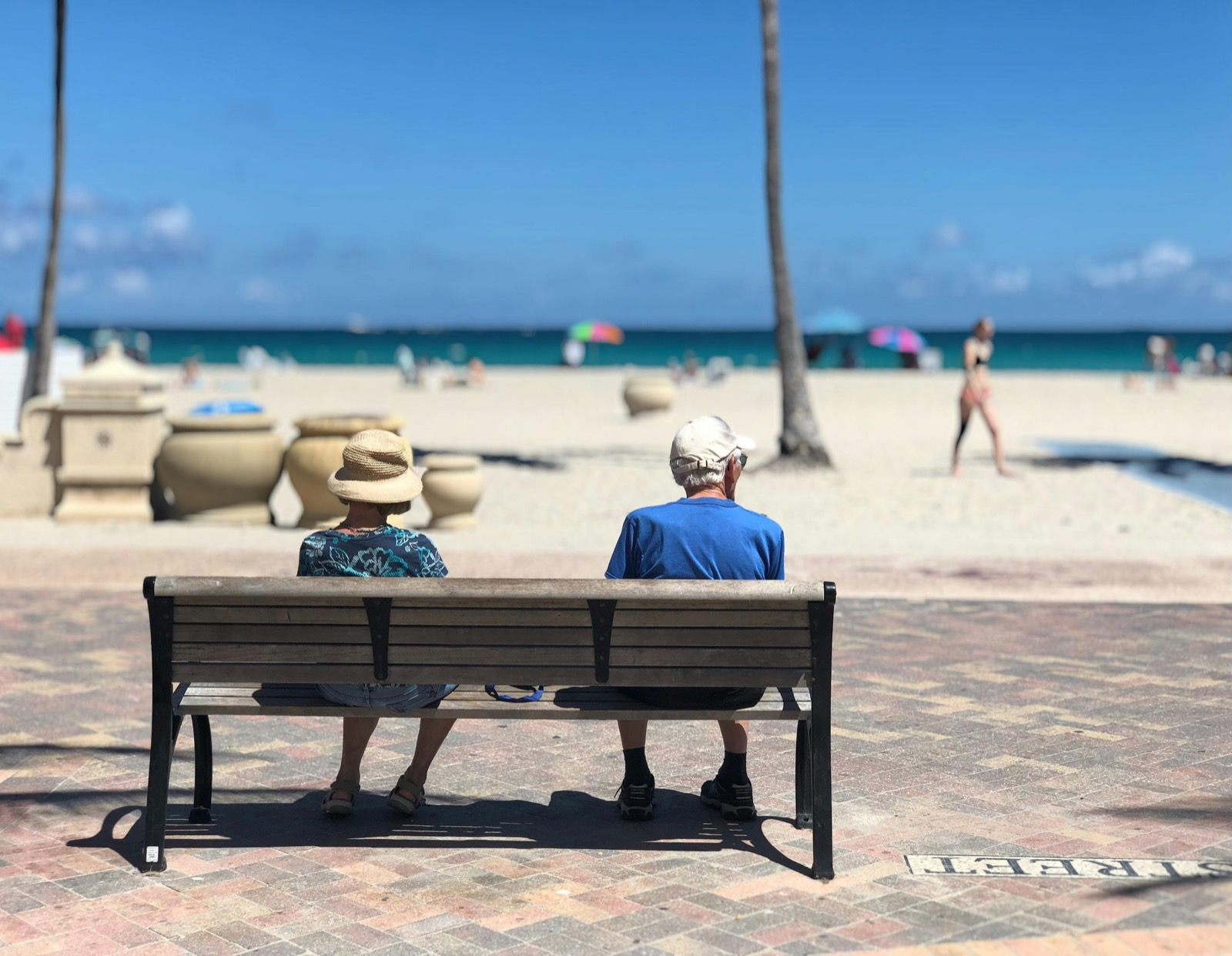 A retired couple enjoying beachfront life at an international destination